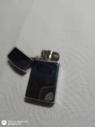 Encendedor Zippo modelo X Quilmes