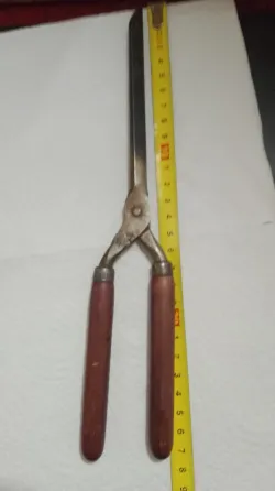 Antiguo Rizador de metal y .madera Quilmes
