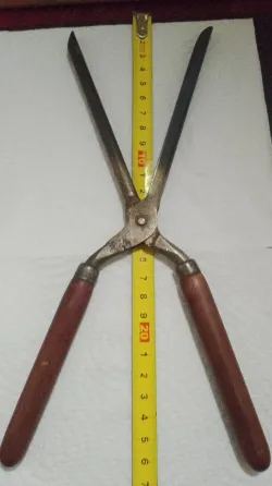 Antiguo Rizador de metal y .madera Quilmes