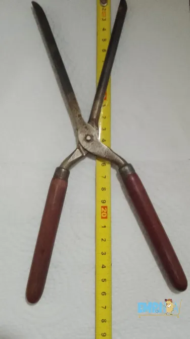 Antiguo Rizador de metal y .madera Quilmes - imagen 1