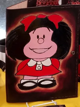 Artículos artesanales en cuero, monederos… Caballito