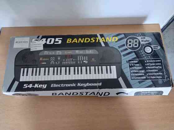 Piano teclado 54 teclas NewVision Lanús