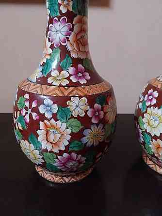 Par de jarrones de estilo floreros antiguos Zárate