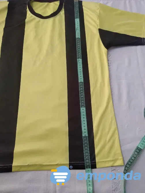 Remera deportiva amarilla y negro Floresta - imagen 1