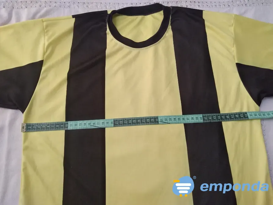 Remera deportiva amarilla y negro Floresta - imagen 2
