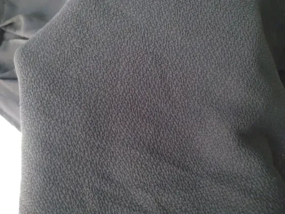 Musculosa negra con lazo, delicada y elegante. Impecable Floresta