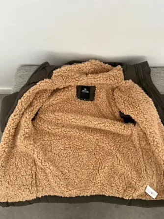 Campera abrigada Rip Curl verde. Talle 16. Usada-como nueva Villa Devoto