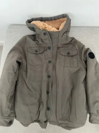 Campera abrigada Rip Curl verde. Talle 16. Usada-como nueva Villa Devoto