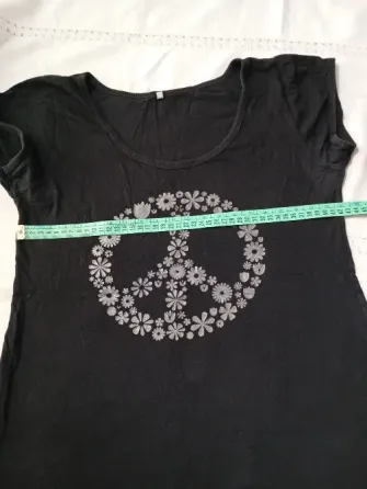 Remera de algodon "Paz". IMPECABLE Floresta