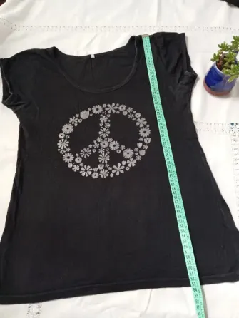 Remera de algodon "Paz". IMPECABLE Floresta