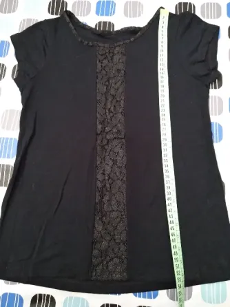 Remera modal y puntilla. Impecable Floresta