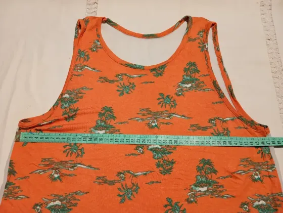 Musculosa combinada, espalda transparente. IMPECABLE Floresta