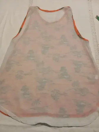 Musculosa combinada, espalda transparente. IMPECABLE Floresta