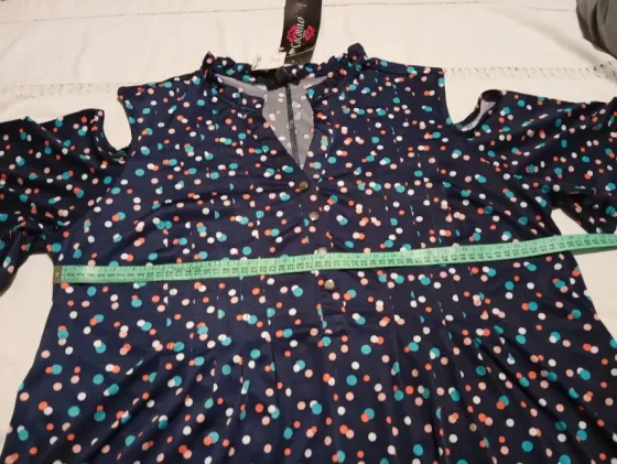 Blusa importada, hombros descubiertos. Amplia. NUEVA Floresta