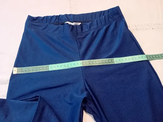 Calza brillosa azul de lycra. NUEVA Floresta