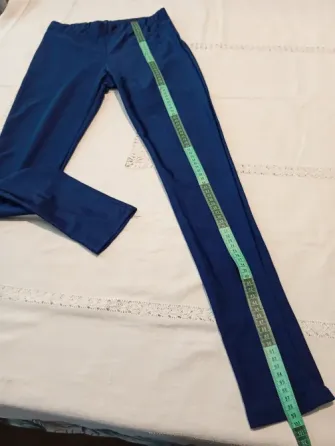 Calza brillosa azul de lycra. NUEVA Floresta