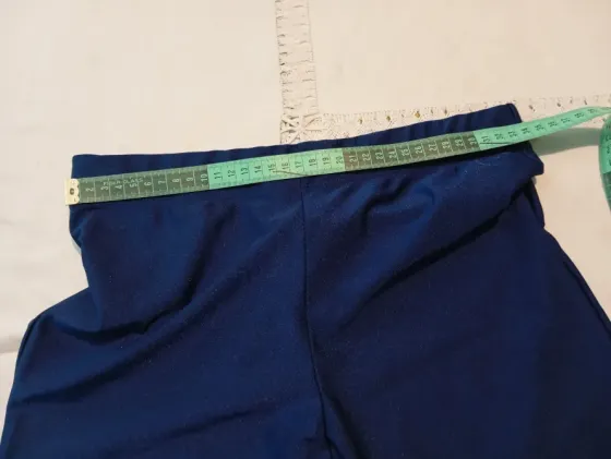 Calza brillosa azul de lycra. NUEVA Floresta