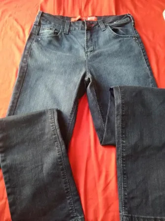 Pantalon, jean elastizado tiro alto. IMPECABLE Floresta