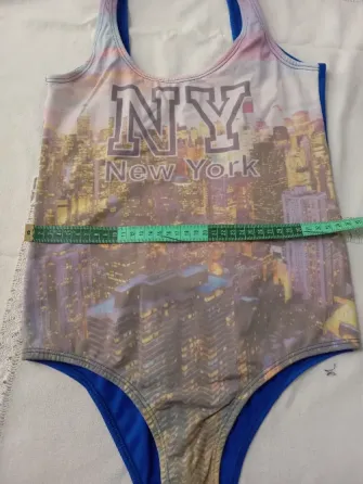 Malla enteriza azul electrico y estampa. IMPECABLE Floresta