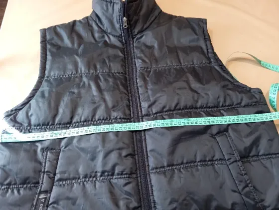 Chaleco puffer amplio unisex. Un uso Floresta