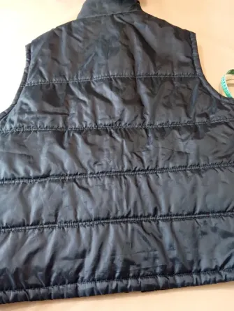 Chaleco puffer amplio unisex. Un uso Floresta