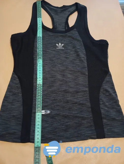 Musculosa deportiva con tela respirable. Impecable Floresta - imagen 1