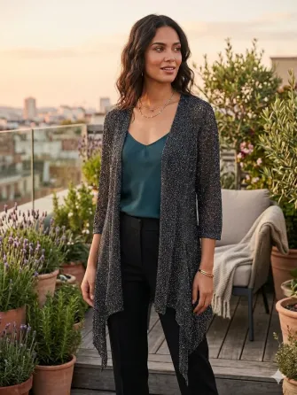 Cardigan tipo kimono con brillos, super delicado. Impecable Floresta